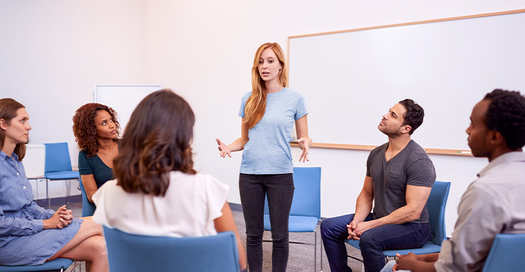Addictions and Community Health Professional program students practicing group facilitation techniques in class.