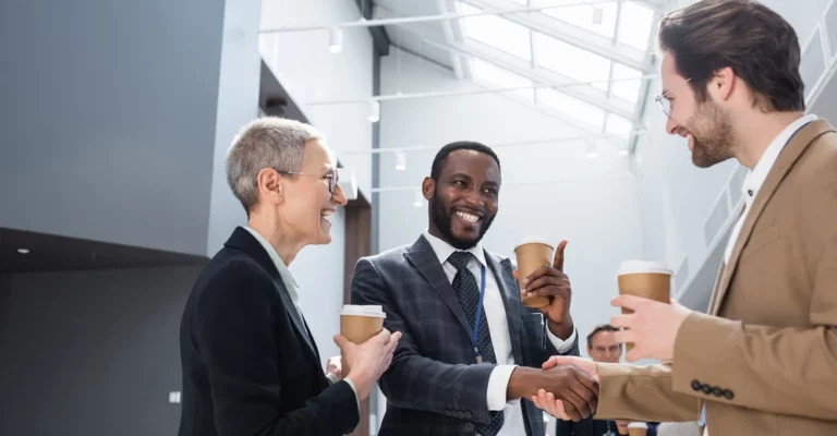a group of people shaking hands career networking desktop