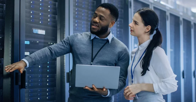 network administrator showing woman servers