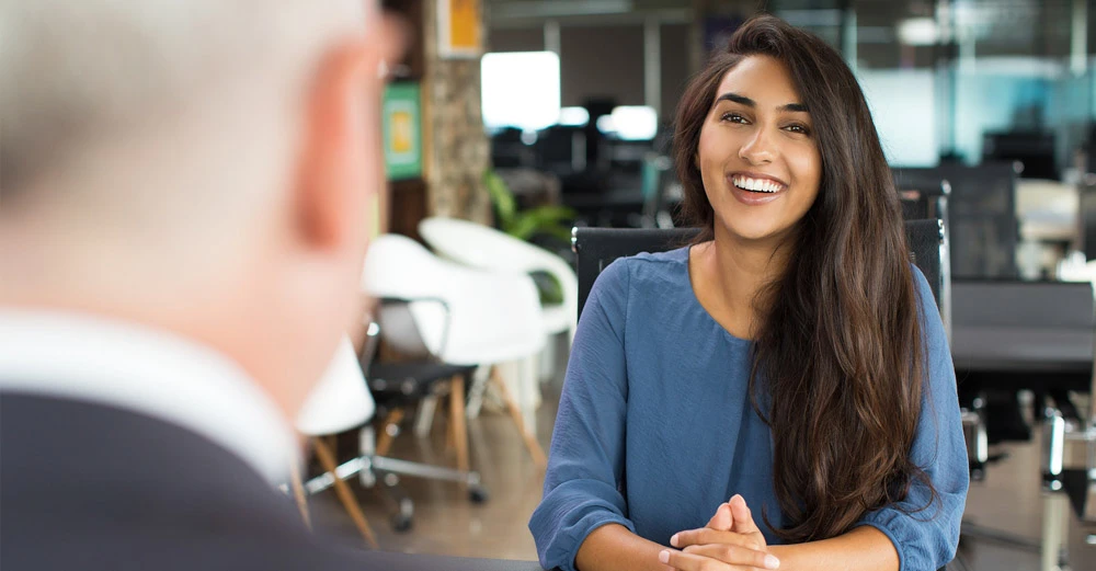 A women sitting for an interview with an employer