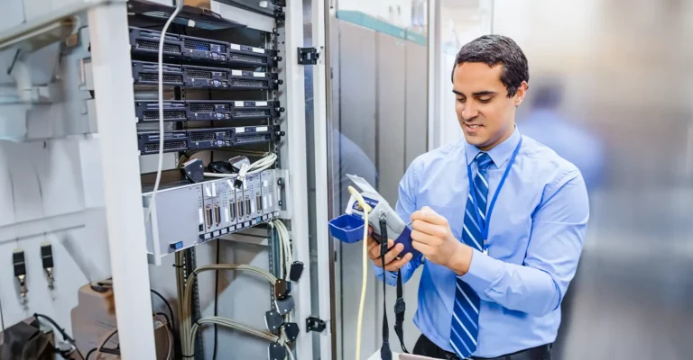A network technician testing cables.