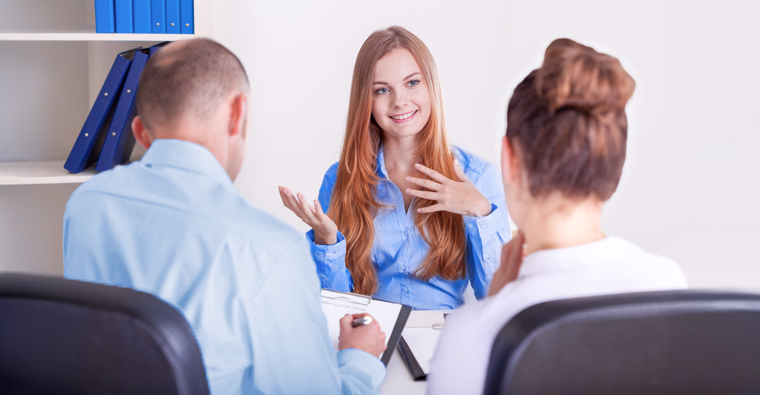 A woman appears confident in an addictions and community health professional job interview.